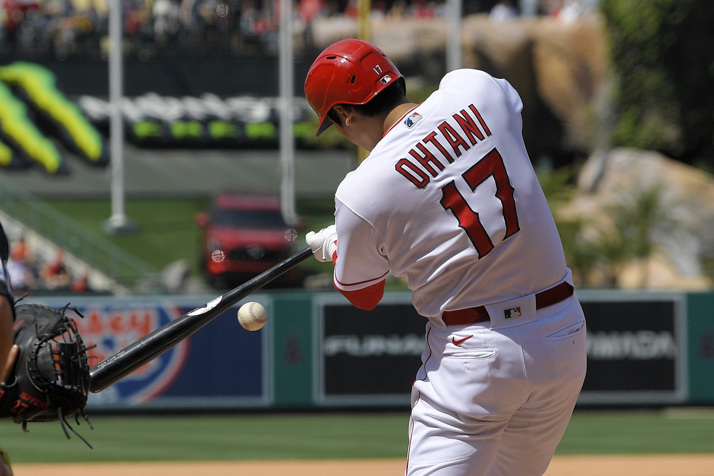 Los Angeles Angels' Shohei Ohtani hits into a fielder's choice during the seventh inning of a baseball game against the Minnesota Twins Sunday, May 21, 2023, in Anaheim, Calif. Mickey Moniak was thrown out at first on the play and Ohtani was safe at first. 