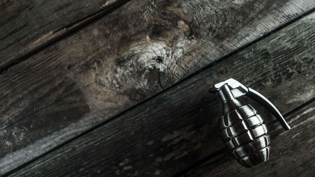 One man is dead and his two children are hospitalized after a hand grenade exploded in an Indiana home Saturday afternoon.