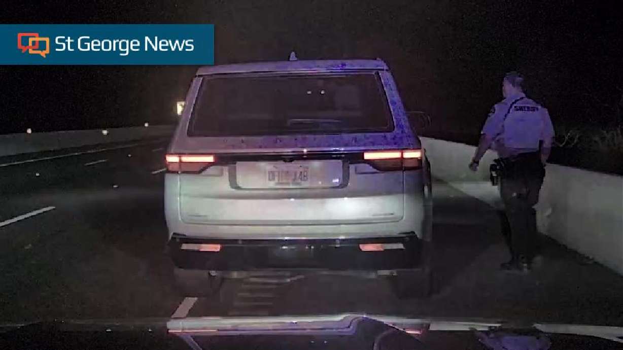 A Washington County sheriff's deputy approaches a Jeep during a traffic stop on I-15 in Leeds Thursday. Nearly half a million dollars of suspected fentanyl pills were seized, officials said.