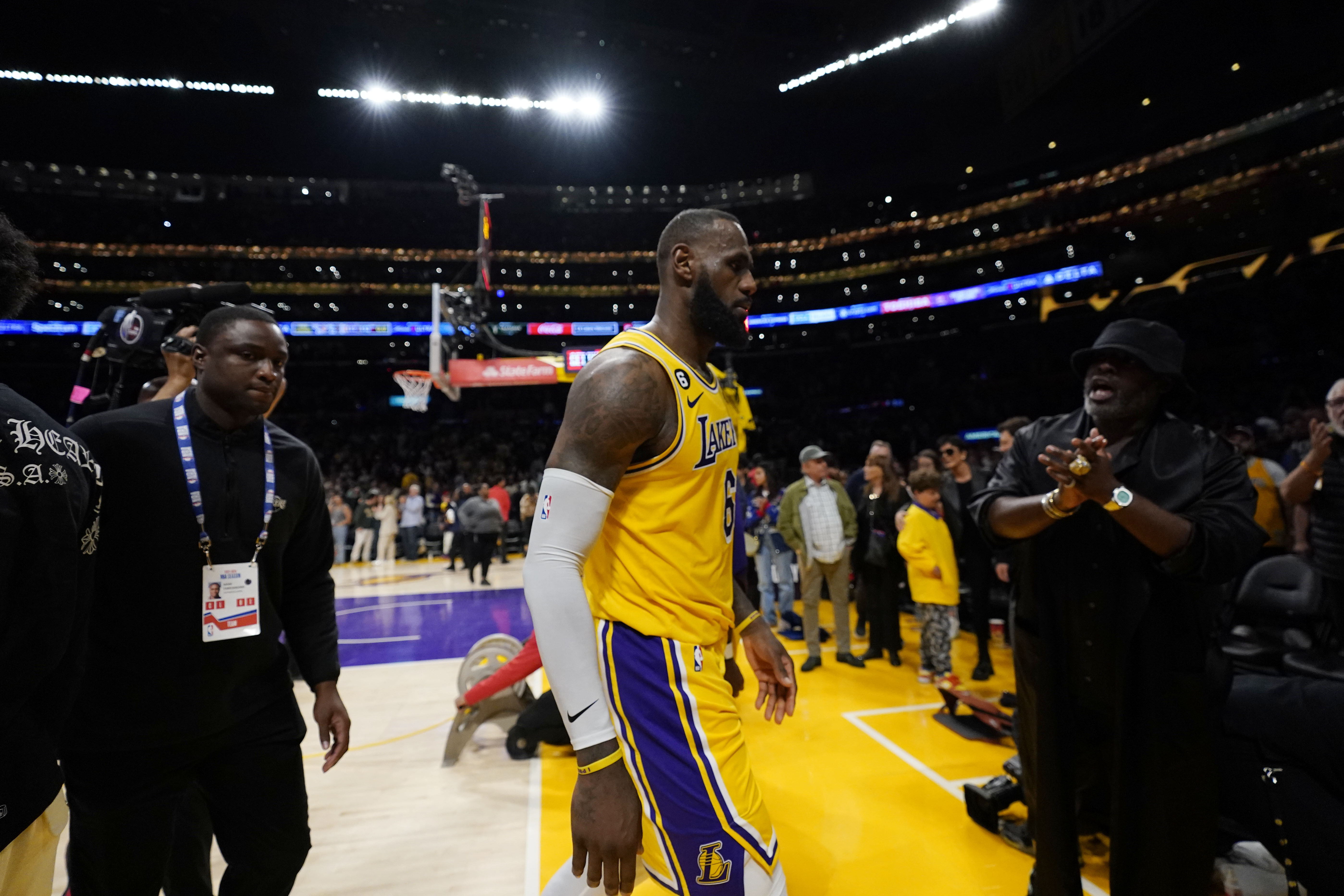 Los Angeles Lakers forward LeBron James walks off the court after a loss to the Denver Nuggets in Game 4 of the NBA basketball Western Conference Final series Monday, May 22, 2023, in Los Angeles.
