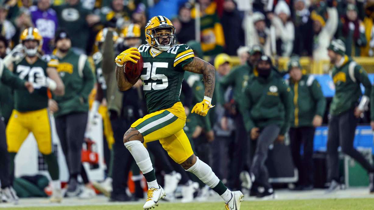 Green Bay Packers cornerback Keisean Nixon (25) runs back a kickoff for a touchdown during an NFL football game against the Minnesota Vikings Sunday, Jan. 1, 2023, in Green Bay, Wis. The NFL has pushed the kickoff return further toward irrelevance with a priority on player safety. League owners voted Tuesday, May 23, 2023, for a one-year trial of an enhanced touchback rule that will give the receiving team the ball at its own 25 with a fair catch of a kickoff anywhere behind that yard line.