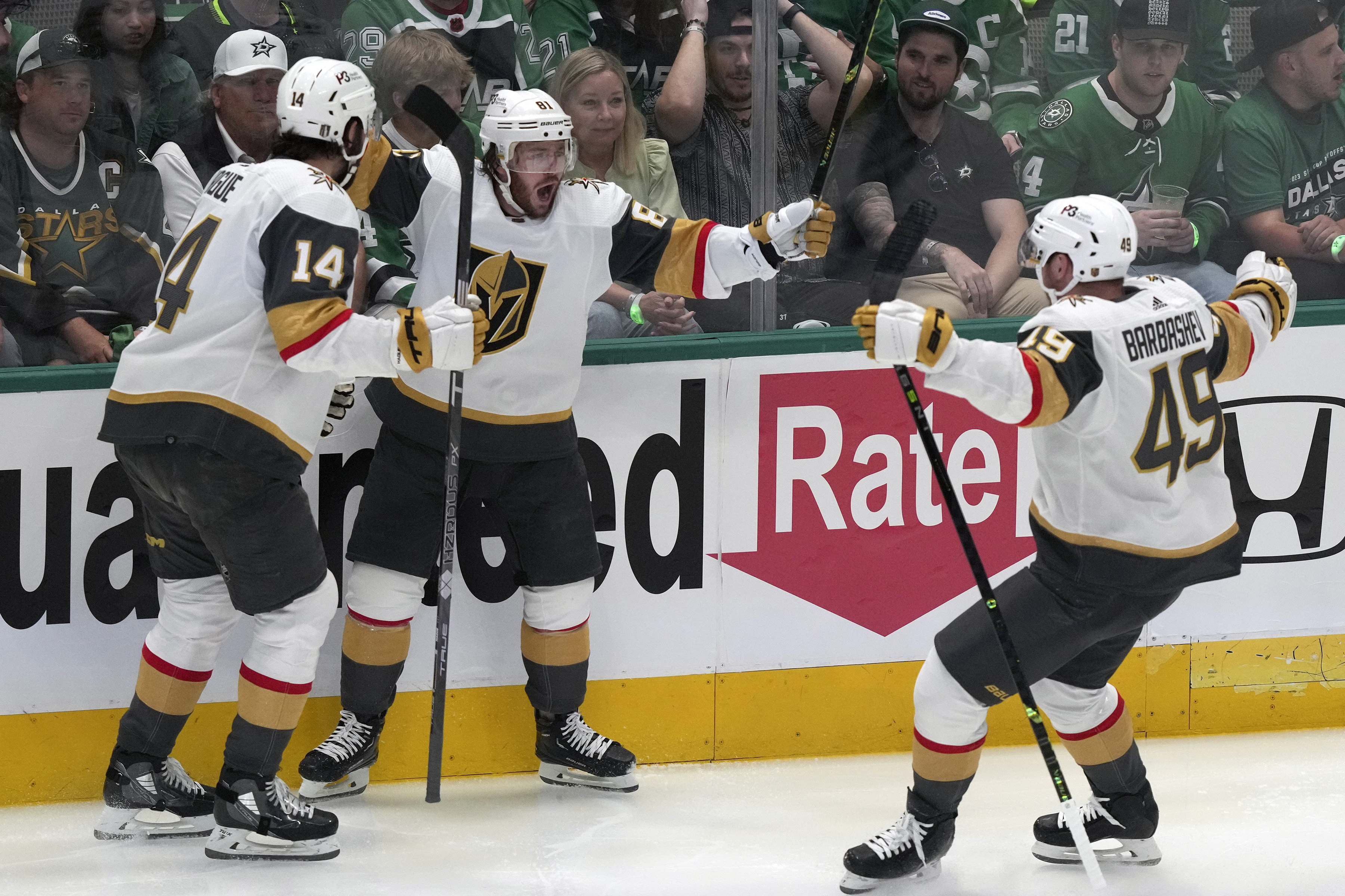 Vegas Golden Knights right wing Jonathan Marchessault (81) celebrates his goal against the Dallas Stars with Nicolas Hague and Ivan Barbashev (49) during the first period of Game 3 of the NHL hockey Stanley Cup Western Conference finals in Dallas, Tuesday, May 23, 2023.