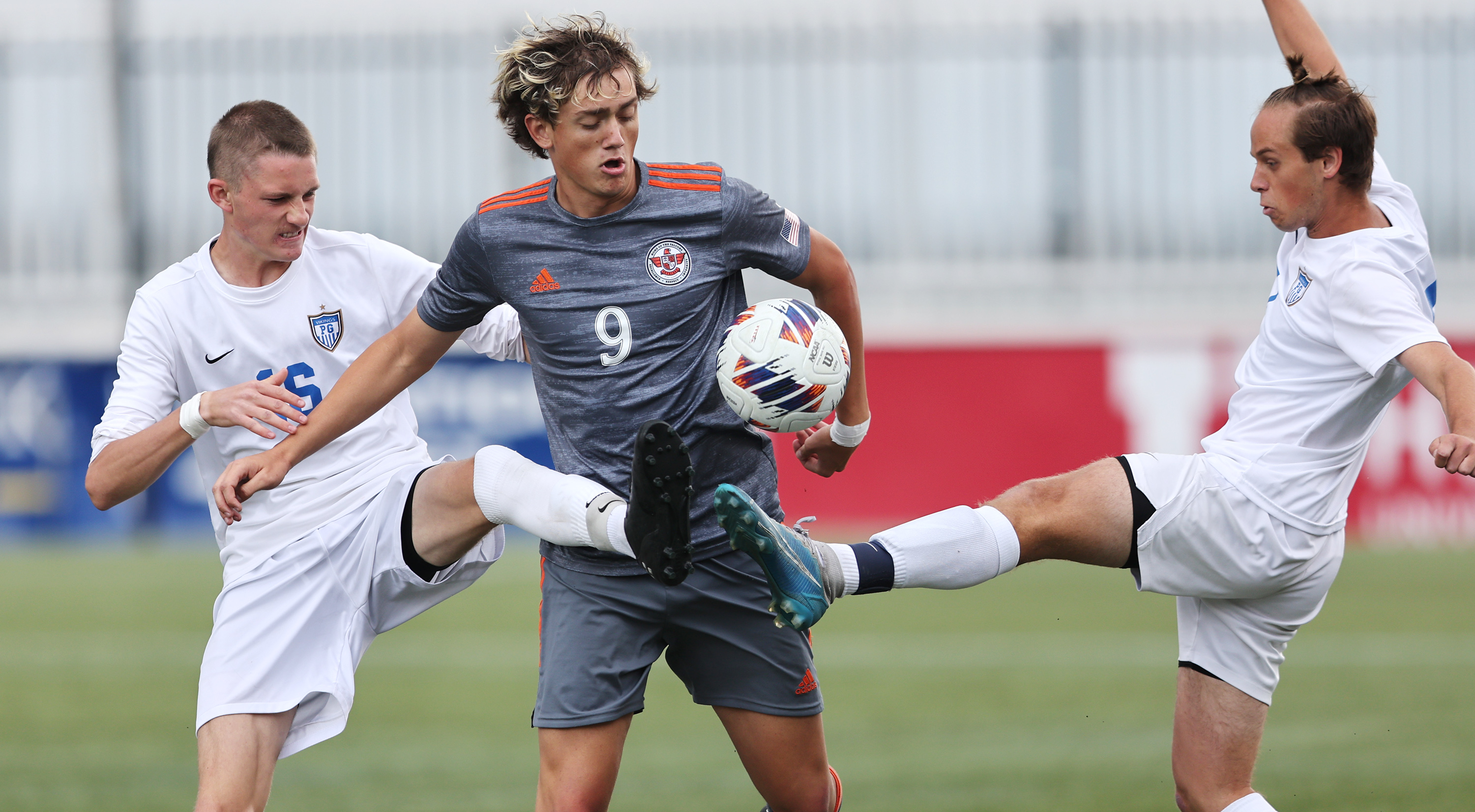 Pleasant Grove’s Caden Pennock and Gavin Fosvick double team Skyridge’s Thorn Cannon as they play in 6A semifinal action at Zions Bank Stadium in Herriman on Tuesday, May 23, 2023.