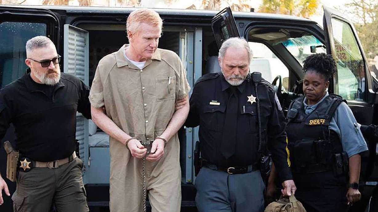 Alex Murdaugh is taken to the Colleton County Courthouse for sentencing March 3 in South Carolina. A federal grand jury has indicted Murdaugh on 22 charges in connection with schemes aimed at stealing money from his clients