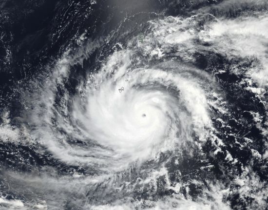 This Tuesday satellite image released by NASA shows Typhoon Mawar, a powerful storm that could deliver the biggest hit in two decades to the U.S. territory in the Pacific, approaching Guam.