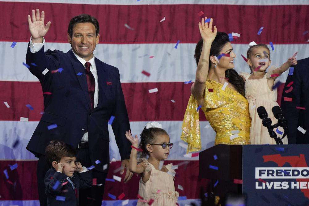 Incumbent Florida Republican Gov. Ron DeSantis, his wife Casey and their children on stage after speaking to supporters at an election night party after winning his race for reelection in Tampa, Fla., Nov. 8, 2022.
