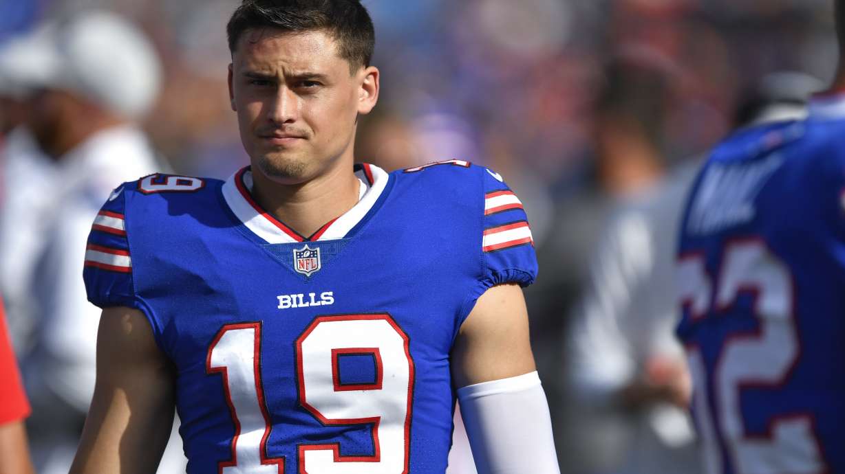 FILE -Buffalo Bills punter Matt Araiza walks on the sideline during the first half of a preseason NFL football game against the Indianapolis Colts in Orchard Park, N.Y., Saturday, Aug. 13, 2022. Former Buffalo Bills punter Matt Araiza was not present when an alleged gang rape of a minor occurred at an October 2021 party in San Diego nor was he visible in videos recovered after the incident, which led to a police investigation and a lawsuit by the woman who said she was attacked, according to witness testimony.