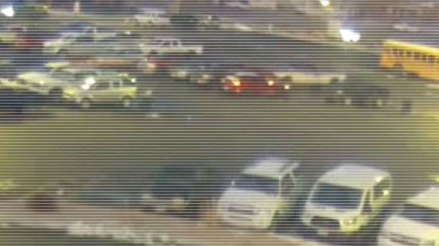 Surveillance cameras at Richfield High School show Christopher Peck’s vehicle parked next to a cheerleader’s car in December 2021. She later reported to police that he asked to purchase her underwear for $30.