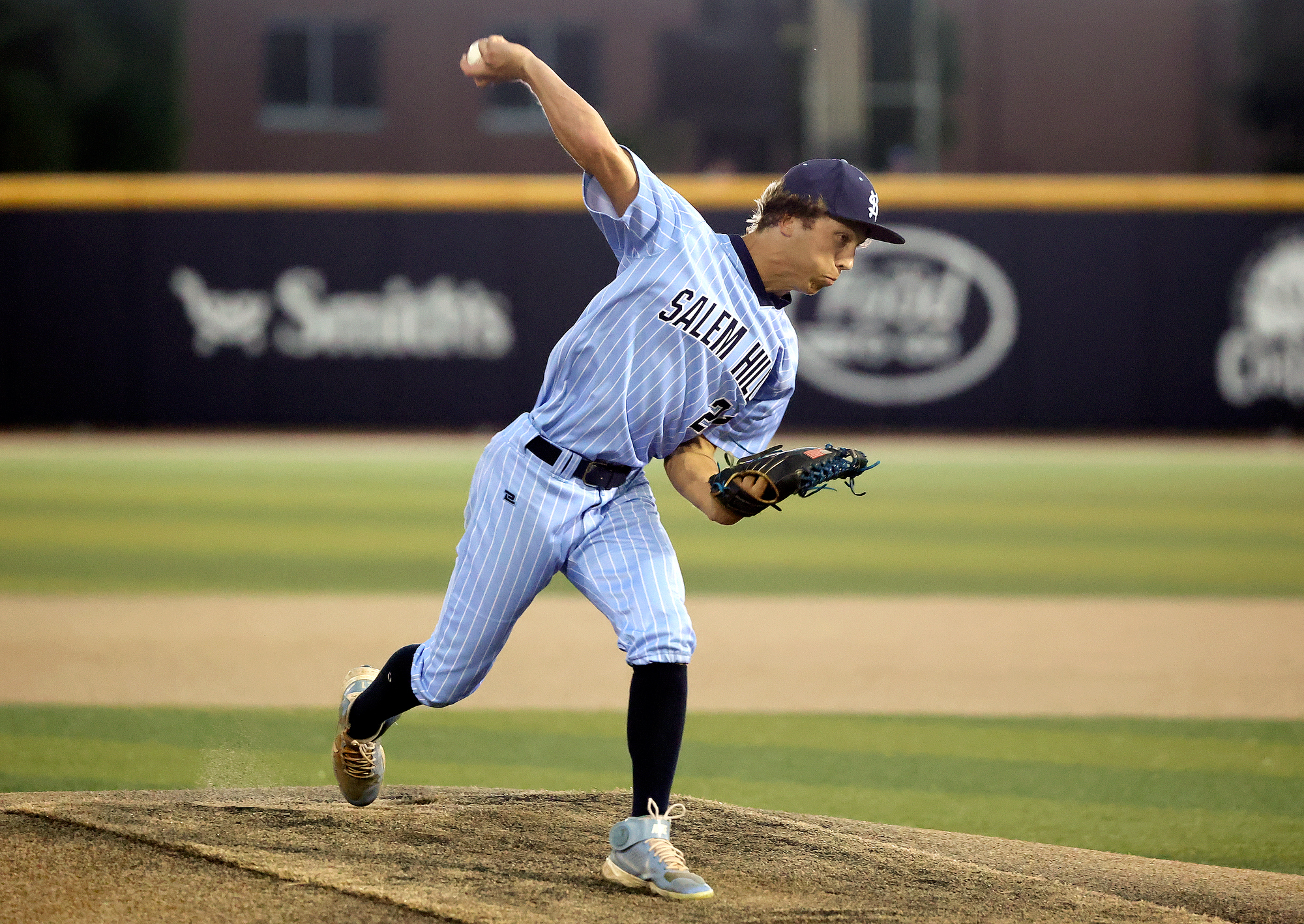 Salem Hills’ Nolan Miller throws a pitch during a 5A baseball state championship quarterfinal game against Jordan at the Miller Park Complex in Provo on Monday, May 22, 2023.