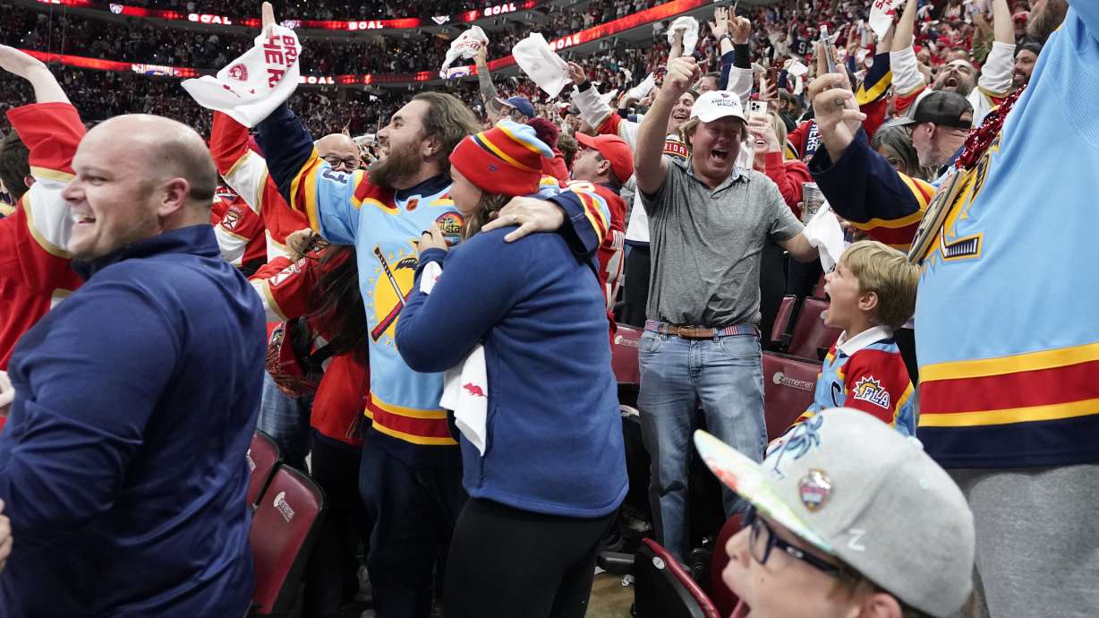 Fans react after Florida Panthers left wing Matthew Tkachuk scored a power-play goal with 4.9 seconds left in the third period of Game 4 of the NHL hockey Stanley Cup Eastern Conference finals against the Carolina Hurricanes, Wednesday, May 24, 2023, in Sunrise, Fla.