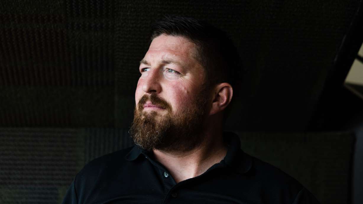 Joshua Riddle, a counselor for the state Office of Rehabilitative Services and a graduate of Utah State University’s rehabilitative counseling program, poses for a portrait at his office in Logan on May 18.