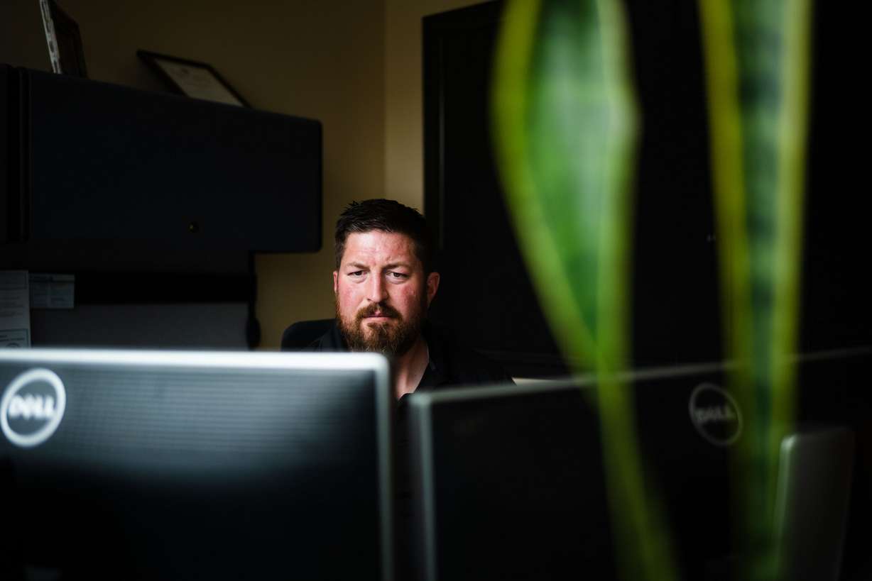 Joshua Riddle, a counselor for the state Office of Rehabilitation Services and a graduate of Utah State University’s rehabilitation counseling program, poses for a portrait at his office in Logan on May 18.