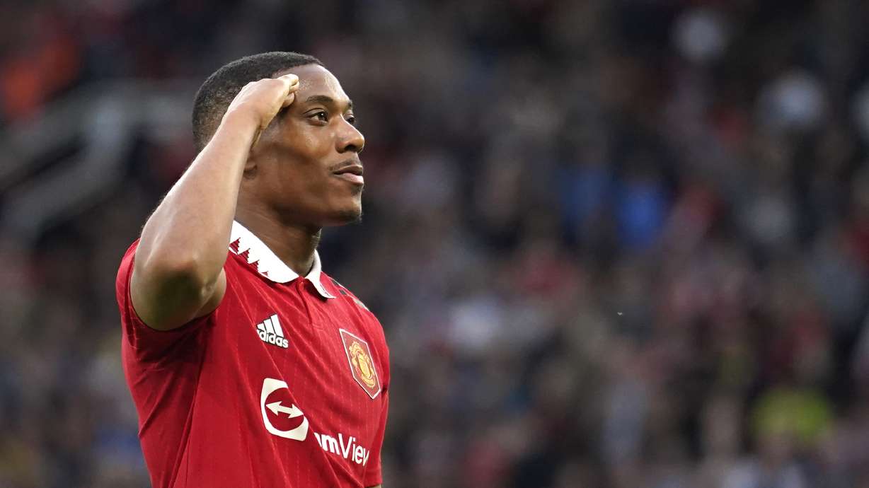Manchester United's Anthony Martial celebrates after scoring his side's second goal during the English Premier League soccer match between Manchester United and Chelsea at the Old Trafford stadium in Manchester, England, Thursday, May 25, 2023.