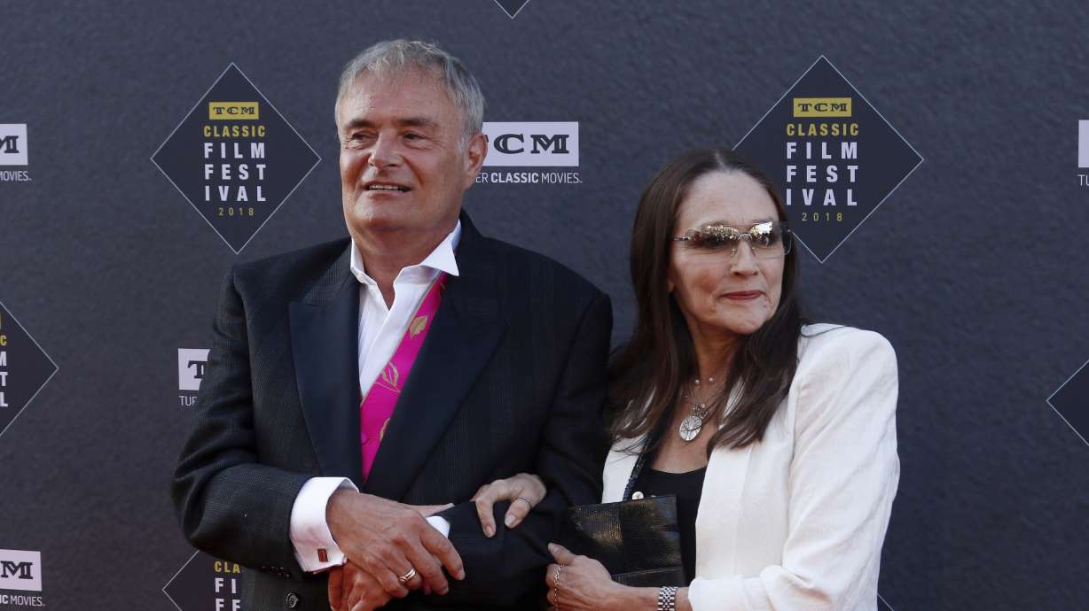 Leonard Whiting, left, and Olivia Hussey arrive at the screening at the TCL Chinese Theatre on April 26, 2018, in Los Angeles. A judge on Thursday said she will dismiss a lawsuit that the stars of 1968's “Romeo and Juliet" filed over the film's nude scene.