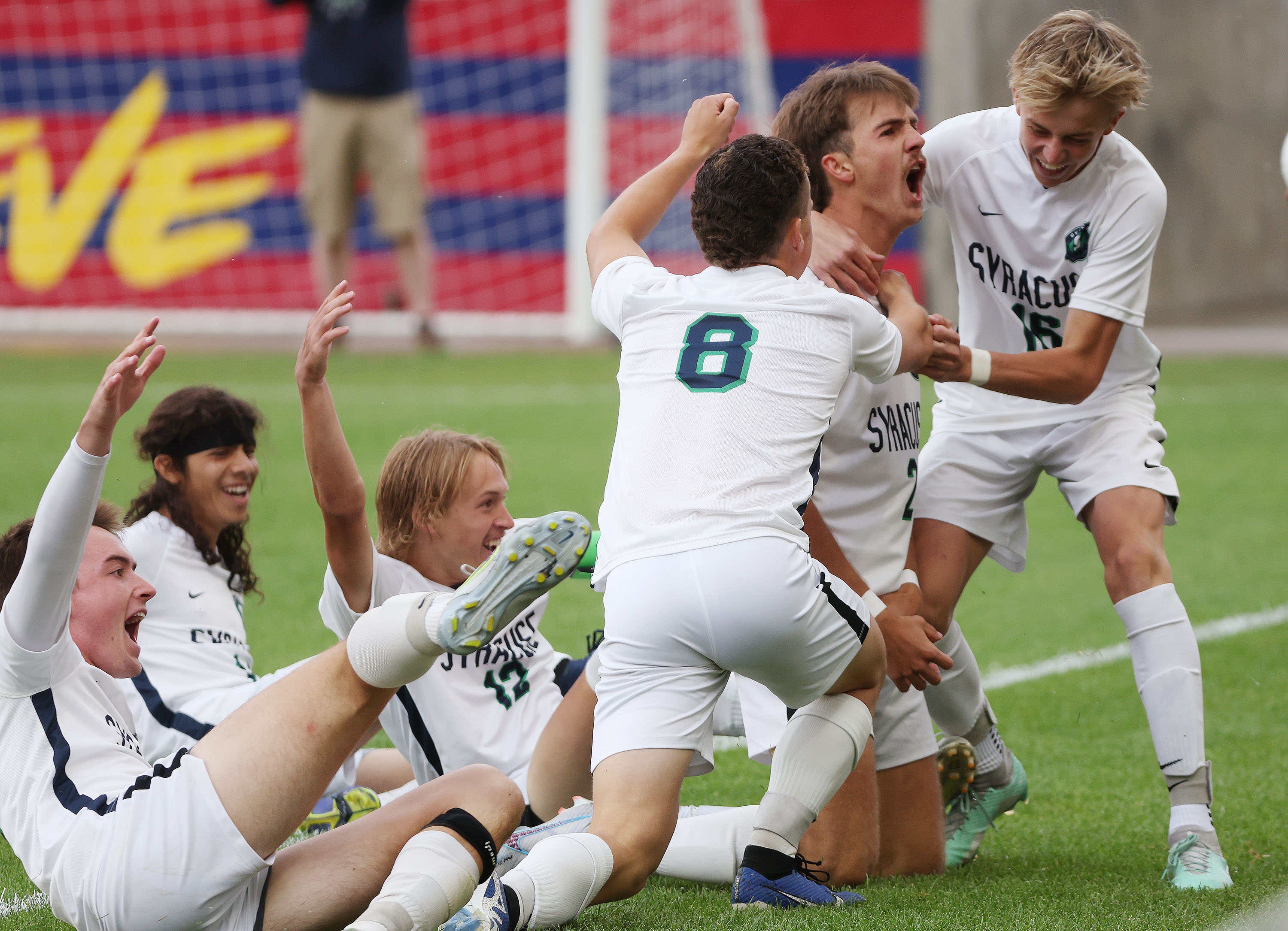 Syracuse’s Ryker Smith (2) celebrates his goal with teammates in the 6A soccer championship game in Sandy on Thursday, May 25, 2023. Syracuse won 2-0.