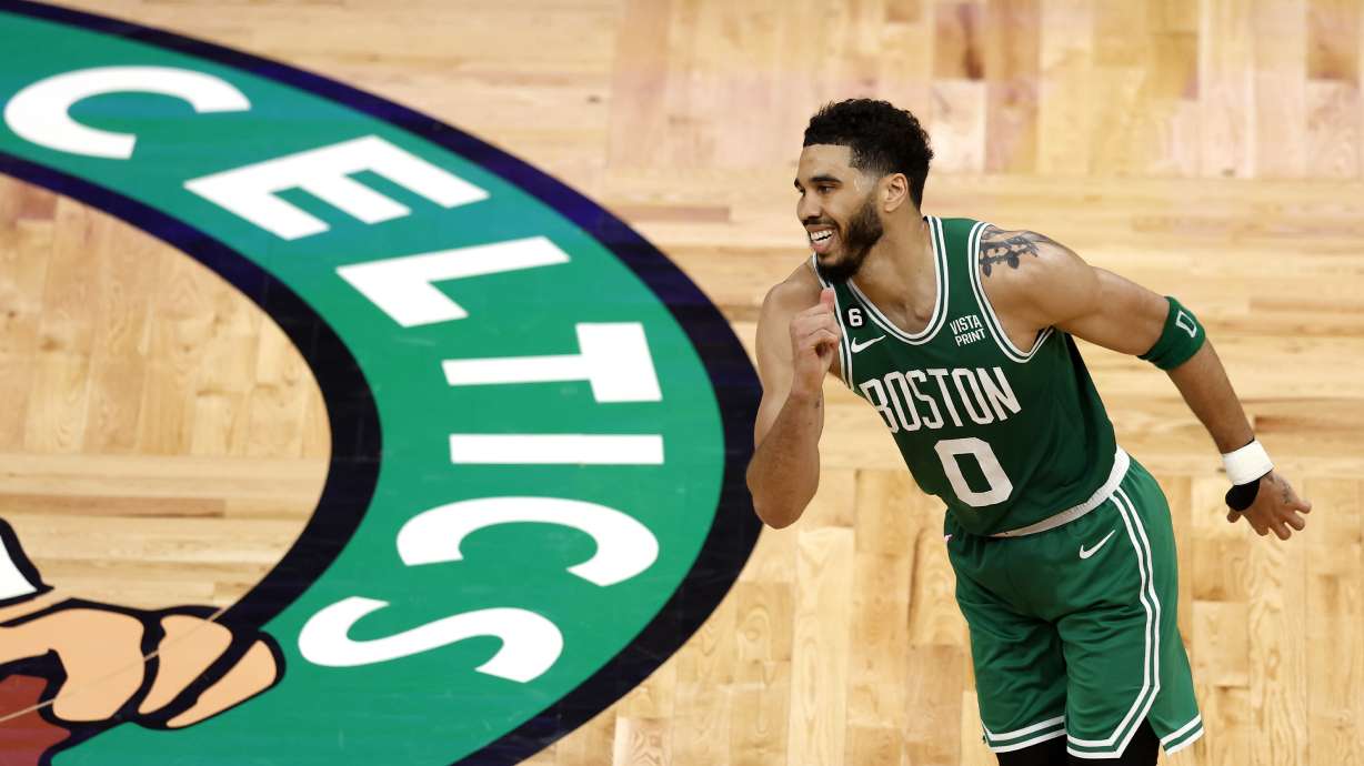 Boston Celtics forward Jayson Tatum heads the other way after missing a shot during the second half in Game 5 of the NBA basketball Eastern Conference finals against the Miami Heat Thursday, May 25, 2023, in Boston.