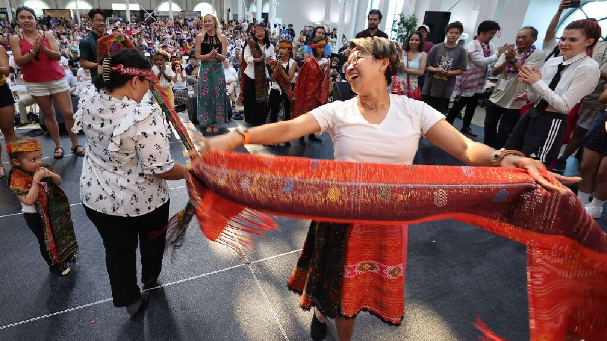 Jus and Fitri Sutansyah dance a traditional Indonesian dance during the annual Asian Festival at the Utah State Fairpark in Salt Lake City on July 9, 2022. The festival will be held again on Saturday, June 3.