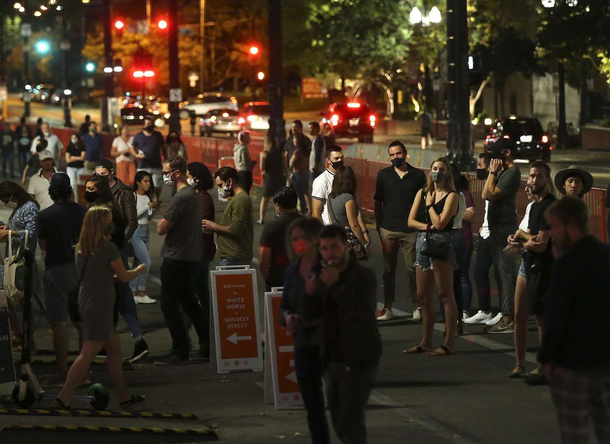 People stroll up Main Street during Downtown SLC Open Streets in Salt Lake City on Sept. 18, 2020.