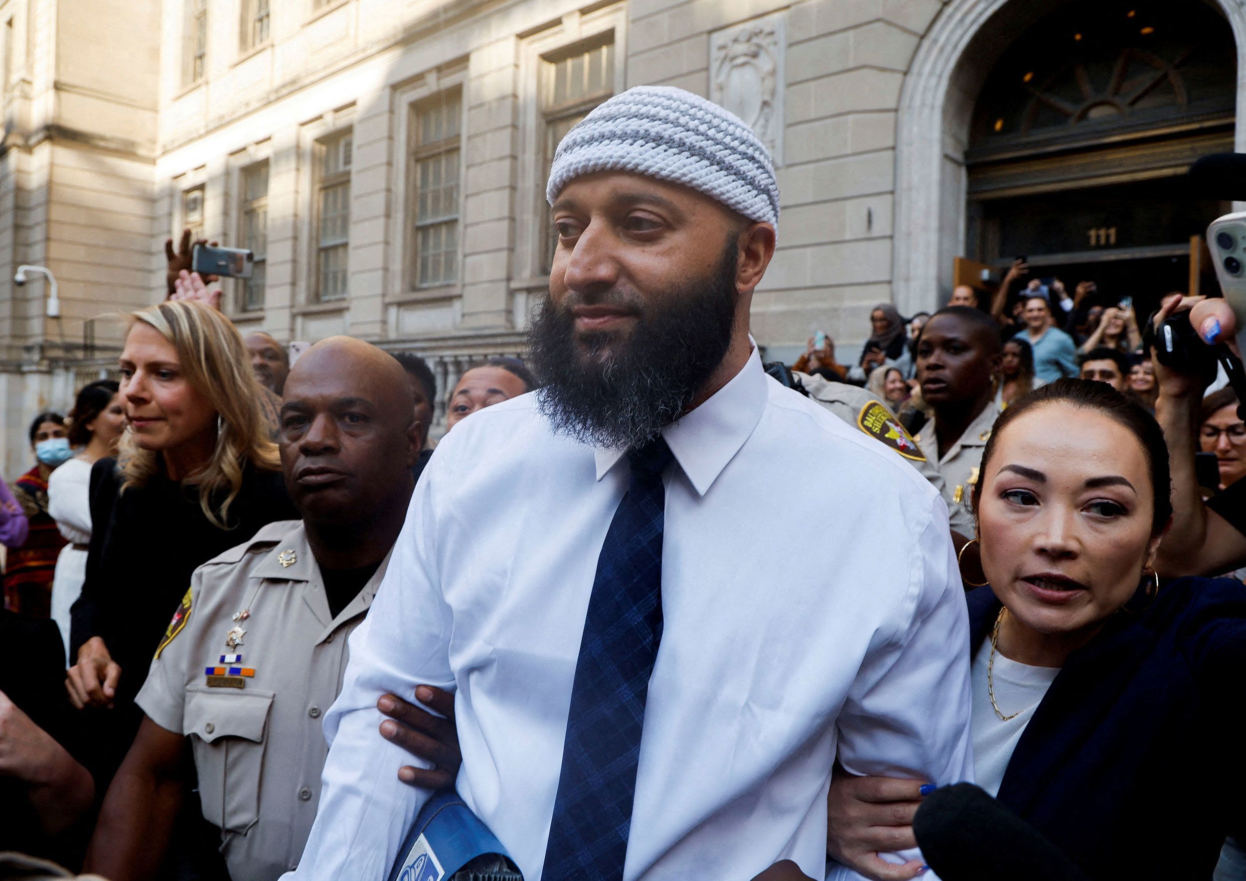 Adnan Syed, whose case was chronicled in the podcast "Serial," leaves court in September. Maryland's Supreme Court blocked the reinstatement of Adnan Syed's murder conviction on Thursday.