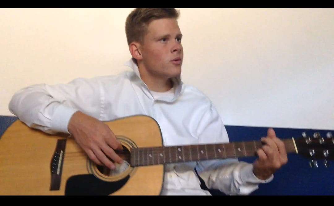Ephraim Cook, of Murray, plays the guitar. The family of the Murray man who died in a rock climbing accident Wednesday remember him as adventurous, loving and full of life.