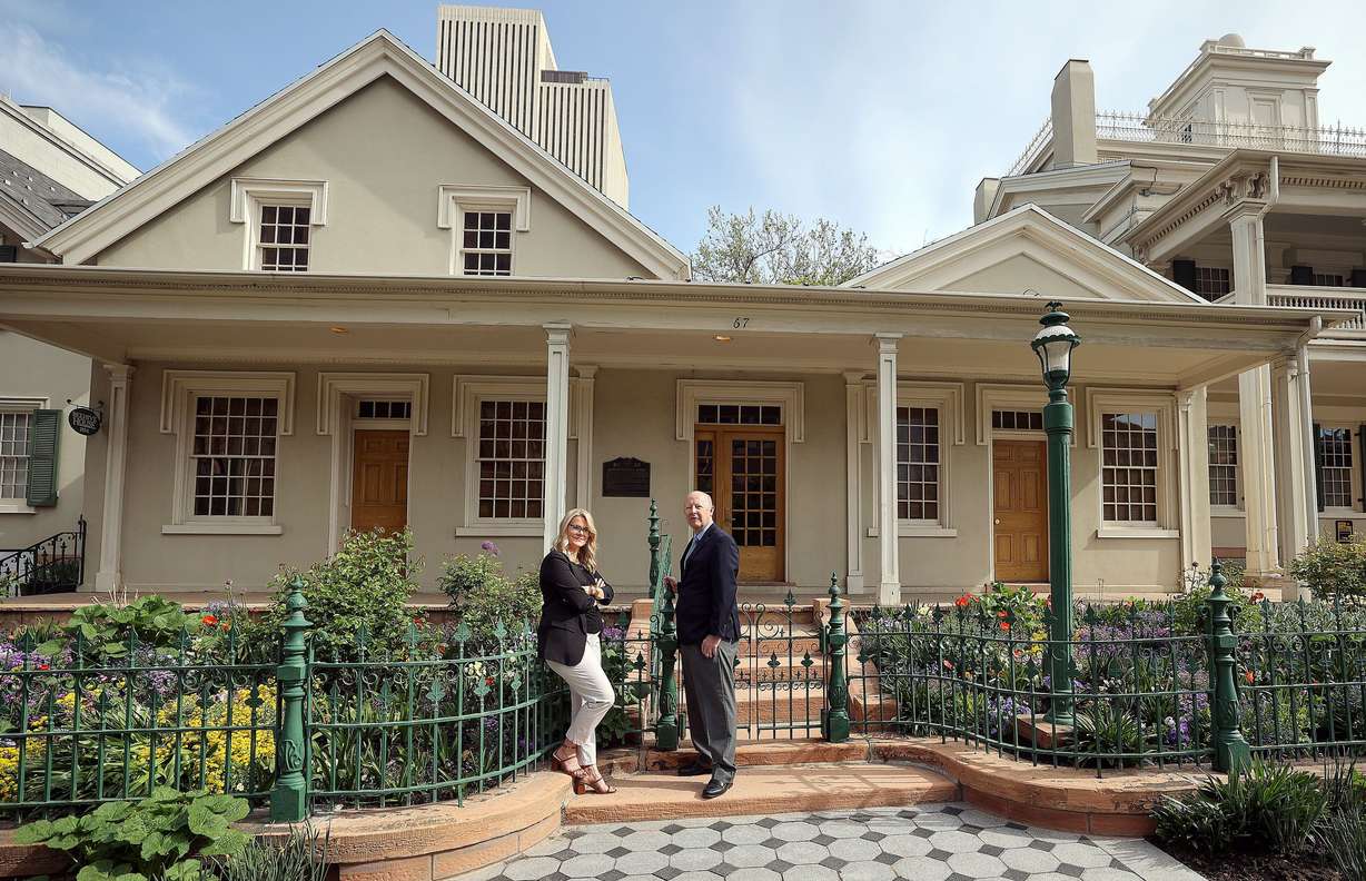 Barbara Jones Brown and Richard Turley, co-authors of “Vengeance is Mine,” pose for a portrait outside of the Beehive House in Salt Lake City on May 12. The opening scene of their book takes place where they are standing, in front of the Beehive House.