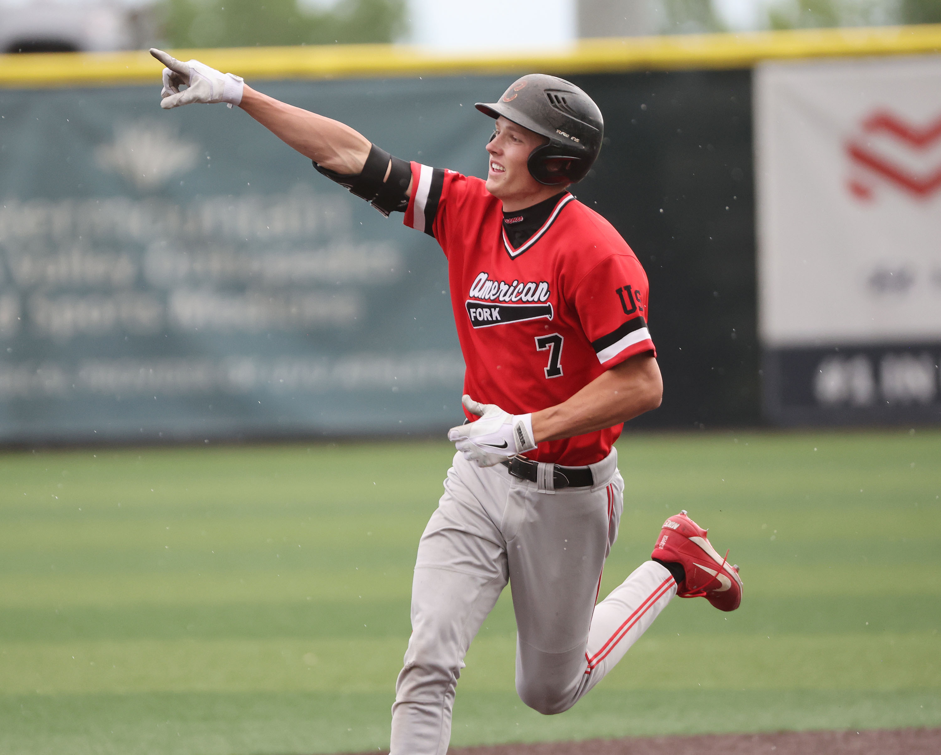 American Fork’s Ryder Robinson (7)  celebrates his homer against Skyridge in the 6A state baseball championship in Orem on Saturday, May 27, 2023.