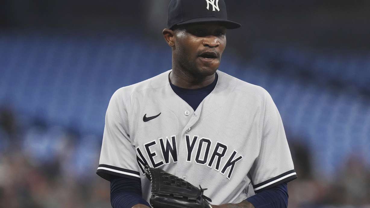 New York Yankees starting pitcher Domingo German walks off the field following the second inning of the team's baseball game against the Toronto Blue Jays on Tuesday, May 16, 2023, in Toronto.