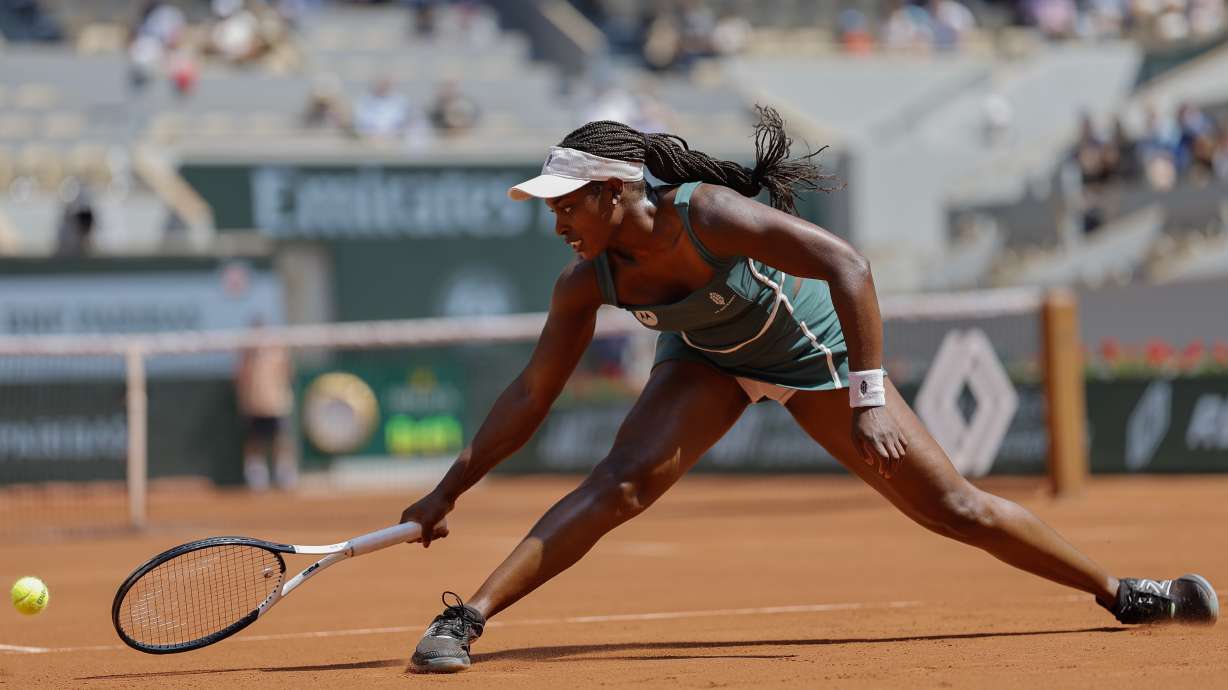 Sloane Stephens of the U.S. slides t play a shot against Karolina Pliskova of the Czech Republic during their first round match of the French Open tennis tournament at the Roland Garros stadium in Paris, Monday, May 29, 2023.