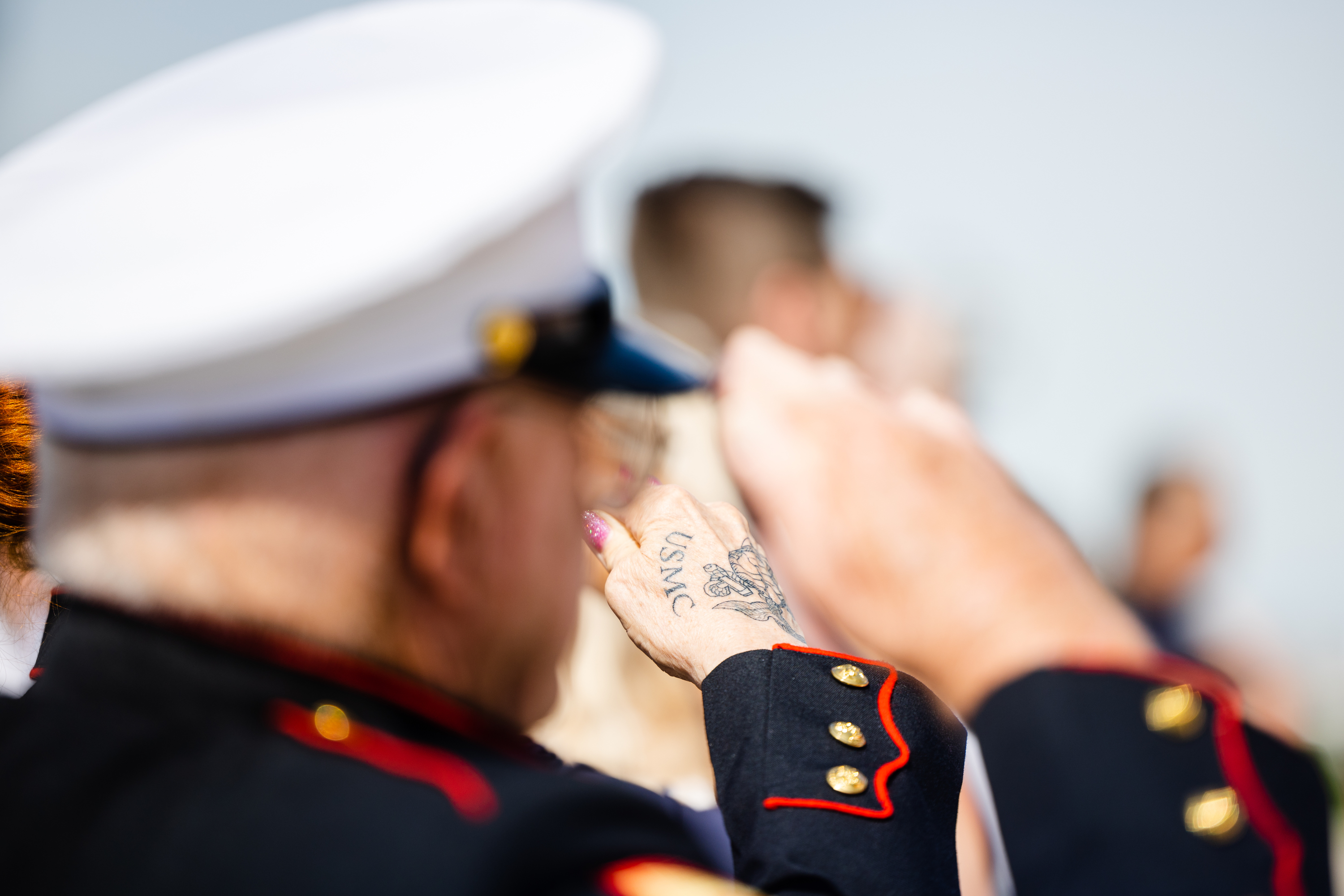 A tattoo of retired United States Marine Corps Cpl. Joann Haines is seen during a Memorial Day commemorative event at the Capitol Monday.