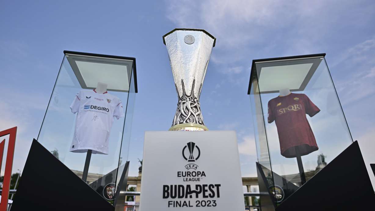 The UEFA Europa League Trophy is displayed in the Fan Zone at Heroes Square in Budapest, Hungary, Tuesday, May 30, 2023 one day before of UEFA Europa League final soccer match between Spanish club FC Sevilla and Italian club AS Roma in Budapest on Wednesday, May 31, 2023.