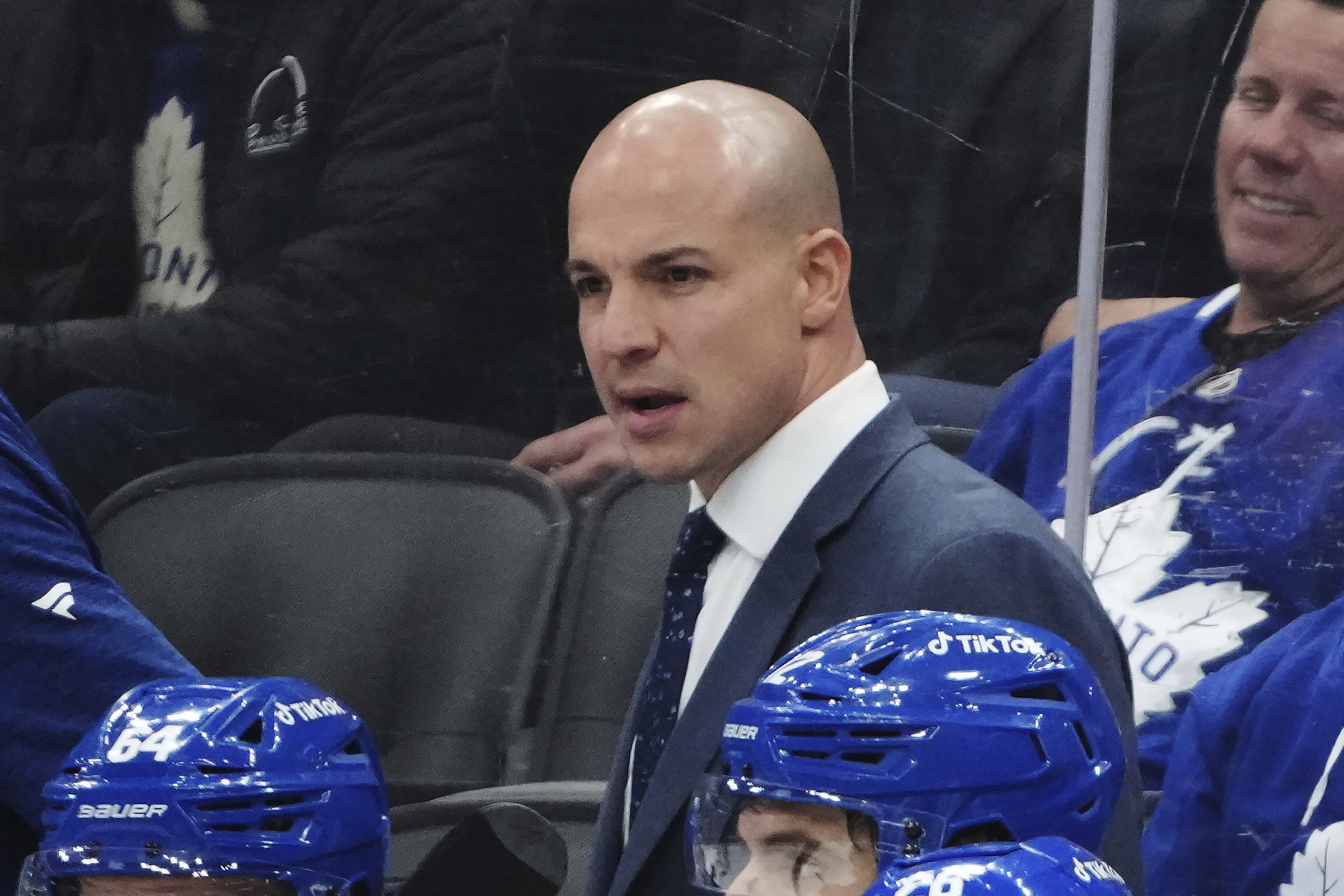 FILE - Spencer Carbery assistant for the Toronto Maple Leafs looks on from the bench during third period of the NHL Stanley Cup playoff hockey game against the Tampa Bay Lightning in Toronto, on Tuesday, April 18, 2023. The Washington Capitals have hired Carbery as their next coach, the team announced Tuesday, May 30, 2023.