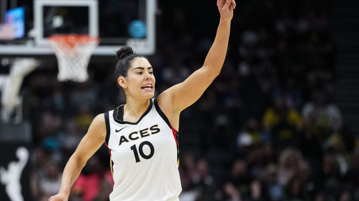 Las Vegas Aces guard Kelsey Plum (10) reacts after making a basket against the Seattle Storm during the second half of a WNBA basketball game Saturday, May 20, 2023, in Seattle. The Aces won 105-64.