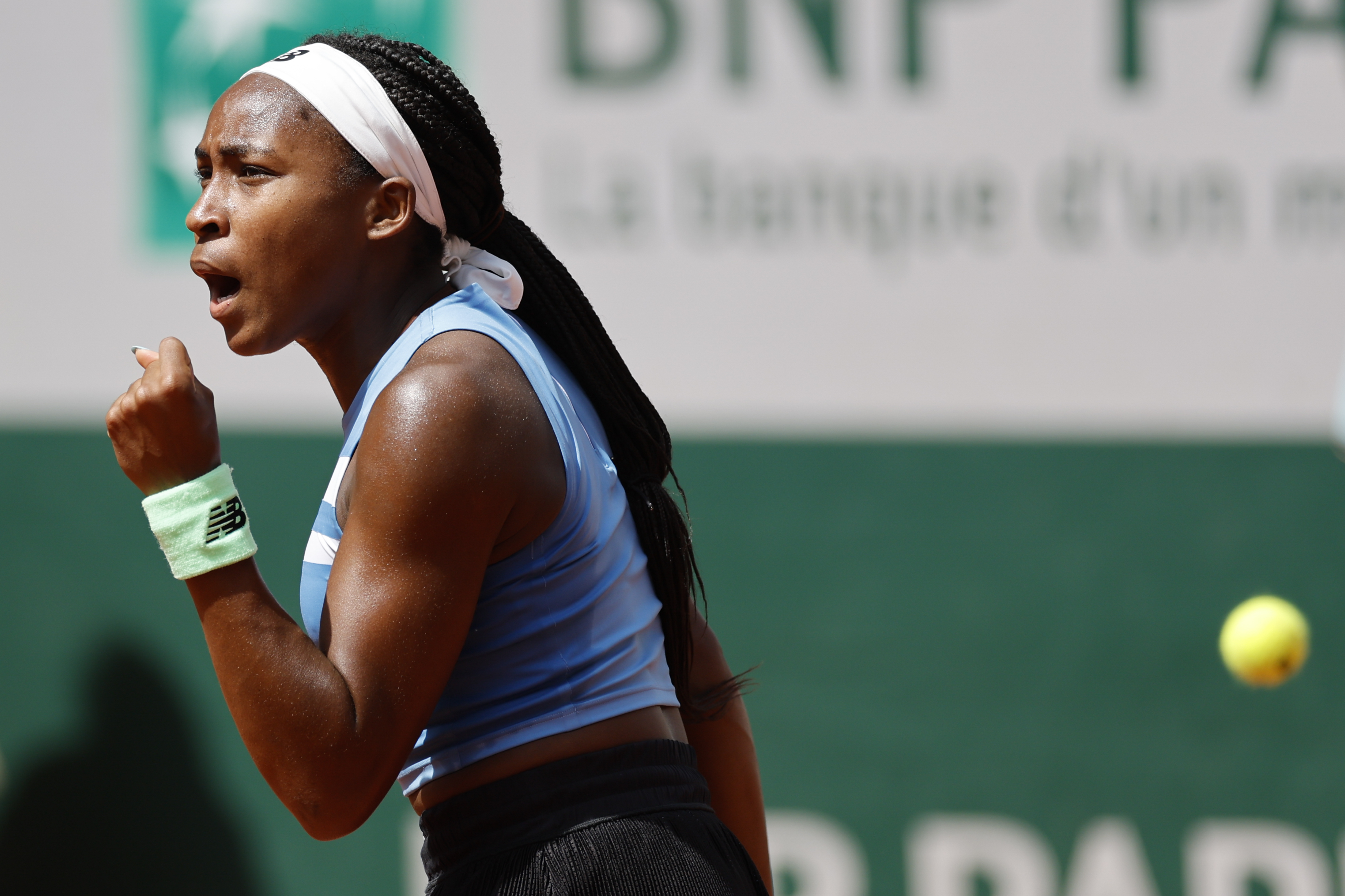 Coco Gauff of the U.S. celebrates winning her first round match of the French Open tennis tournament against Spain's Rebeka Masarova in three sets, 3-6, 6-1, 6-2, at the Roland Garros stadium in Paris, Tuesday, May 30, 2023.