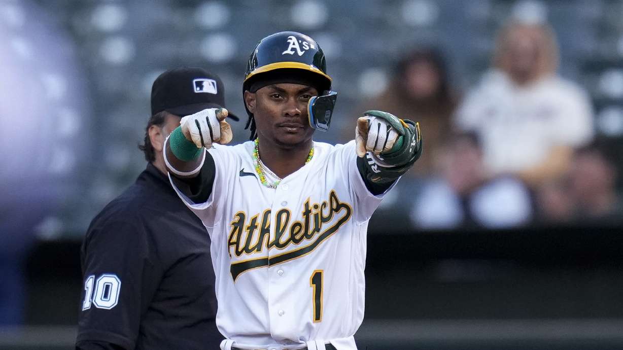 Oakland Athletics' Esteury Ruiz gestures after hitting an RBI single against the Atlanta Braves during the fifth inning of a baseball game in Oakland, Calif., Tuesday, May 30, 2023.
