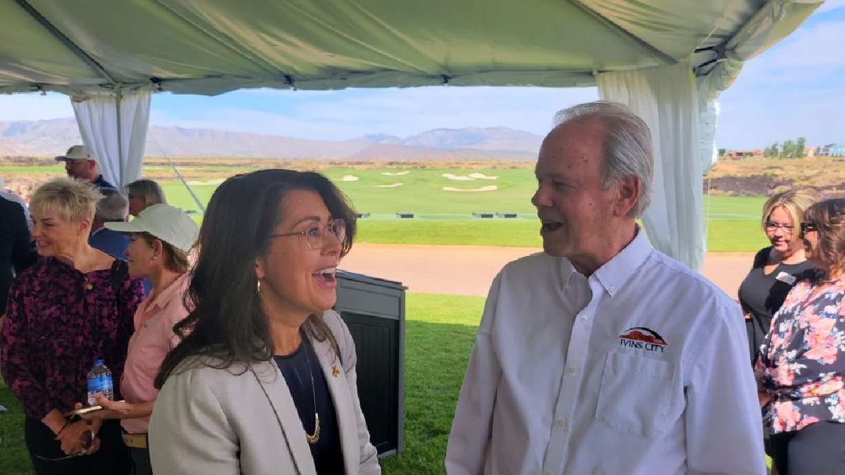 Lt. Gov. Deidre Henderson shares a laugh with Ivins Mayor Chris Hart at the press conference announcing that Black Desert Resort will be hosting an LPGA Tour event starting in 2025, Ivins, Tuesday.