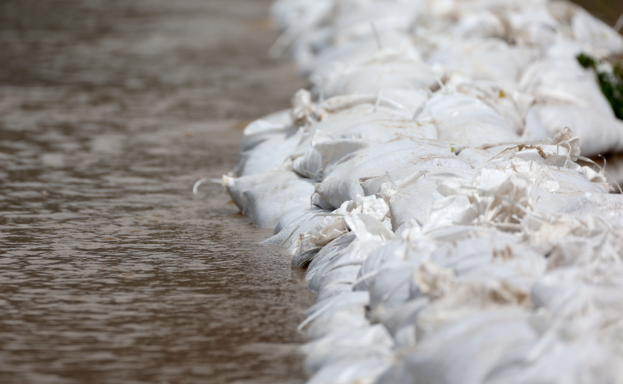Sandbags are set up to contain flooding in Santaquin on May 17. Government leaders Utah County and Sandy his week issued emergency declarations to respond to potential flooding.
