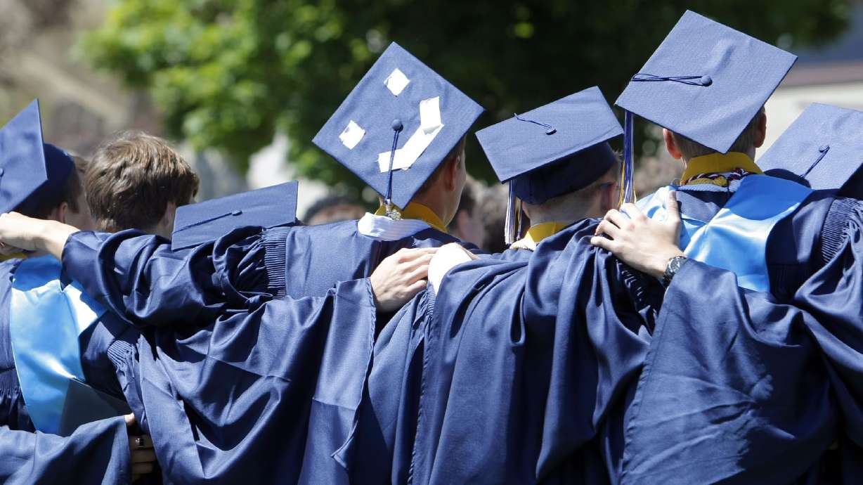 Skyline High School grads on May 31, 2012. A Colorado honor student pushed back after school district officials told her she could not wear a graduation stole that features American and Mexican flags.