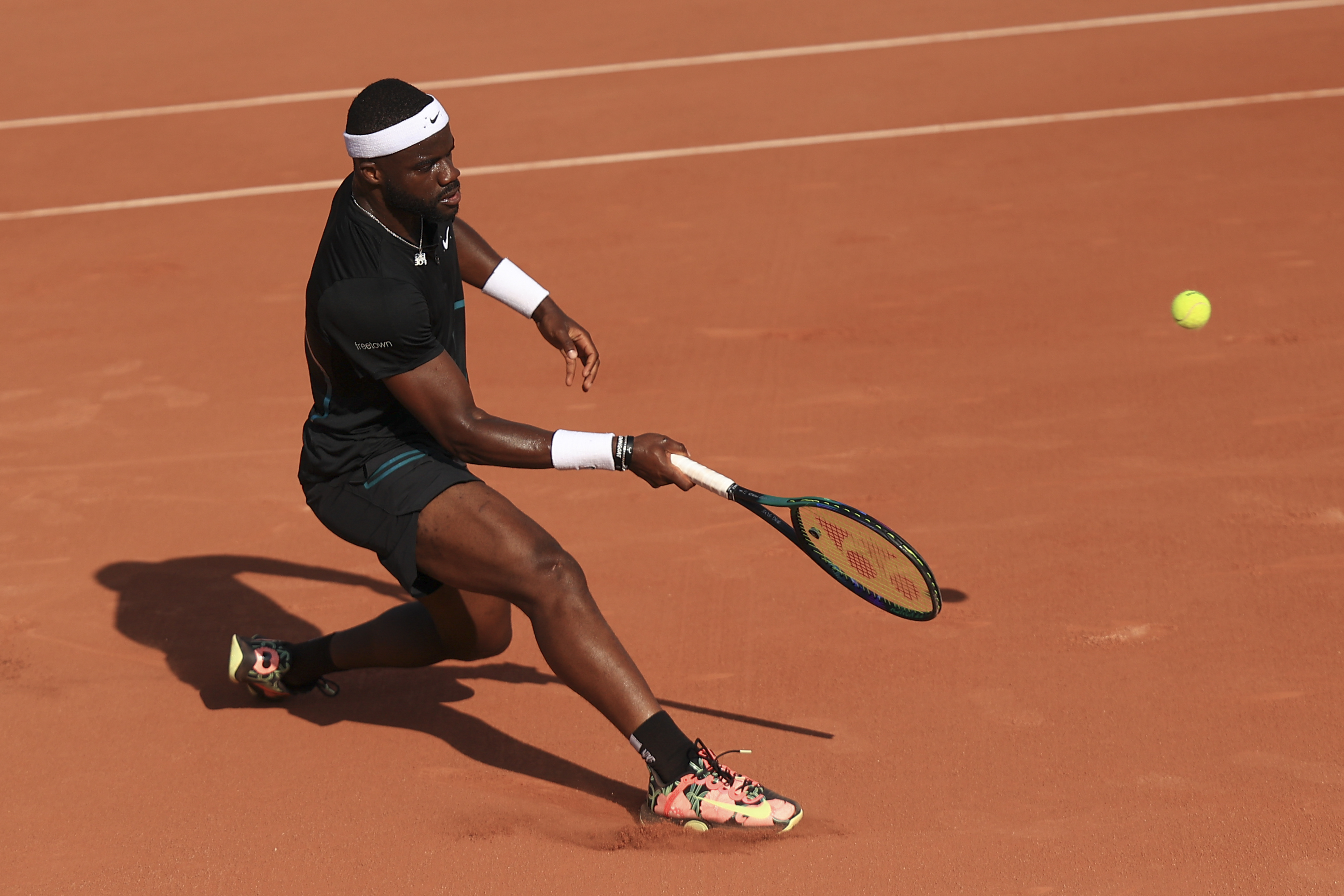 FILE - Frances Tiafoe of the U.S. plays a shot against Serbia's Filip Krajinovic during their first round match of the French Open tennis tournament at the Roland Garros stadium in Paris, May 29, 2023. The group that runs the French Open tennis tournament has hired an artificial intelligence company to monitor players' social media accounts in a bid to try to protect athletes from cyberbullying.
