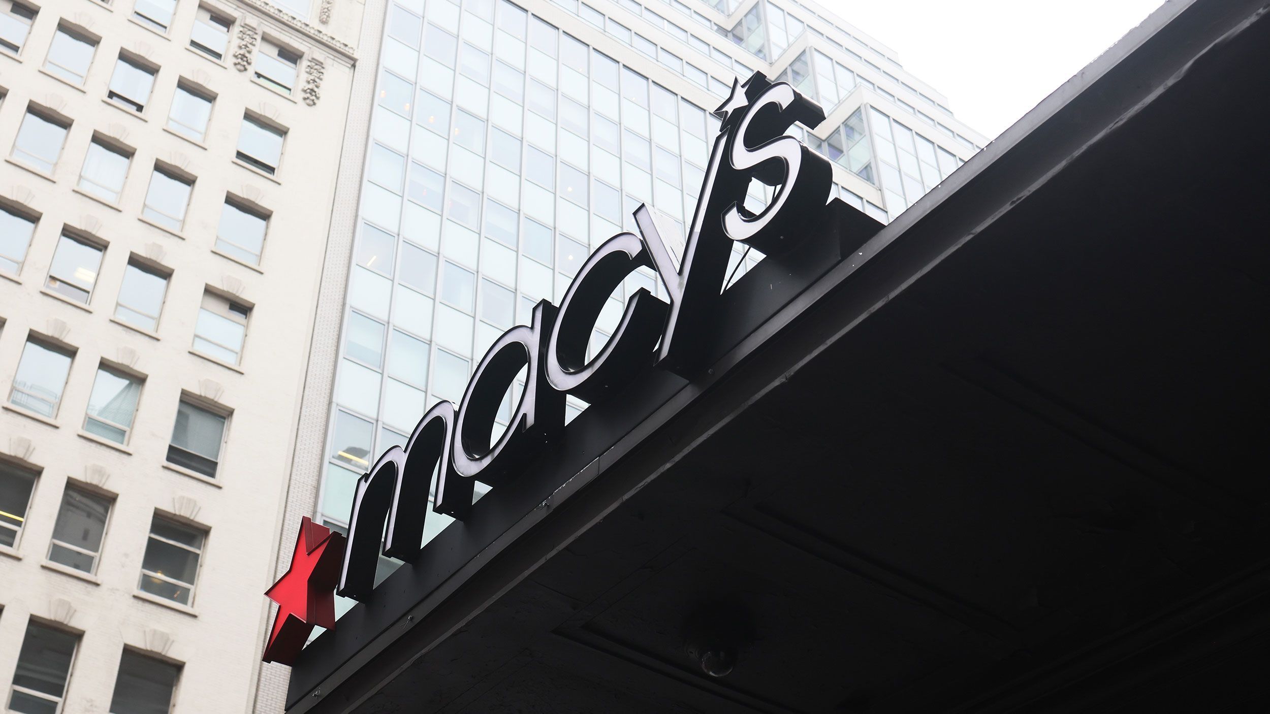 Macy's, Costco and other big chains say shoppers are pulling back at their stores and changing what they buy.