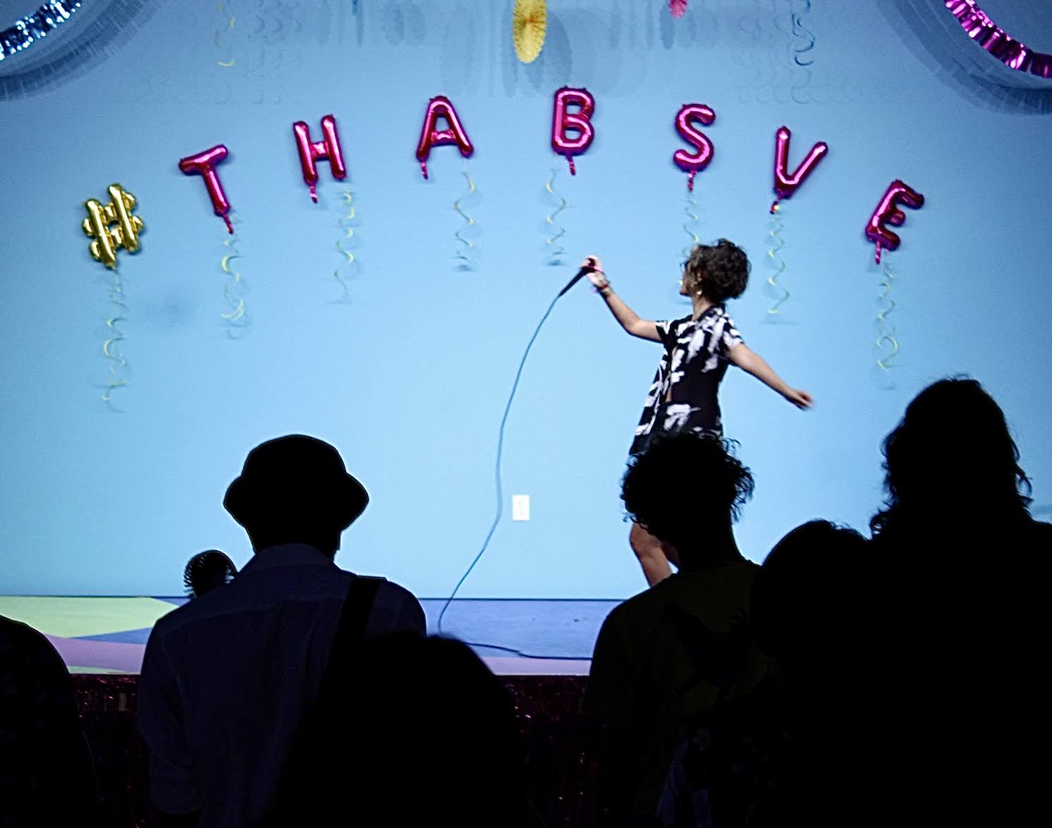 Attendees participate in Burning Sissy Valley's pride event for queer individuals of color at the Kearns Library in 2021.