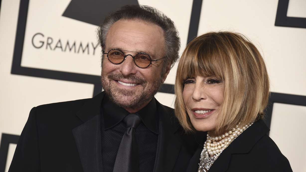 Barry Mann, left, and Cynthia Weil arrive at the 57th annual Grammy Awards at the Staples Center on Feb. 8, 2015, in Los Angeles. Weil, who helped write "You've Lost That Lovin' Feeling," "On Broadway," "Walking in the Rain" and dozens of other hits, has died at age 82.