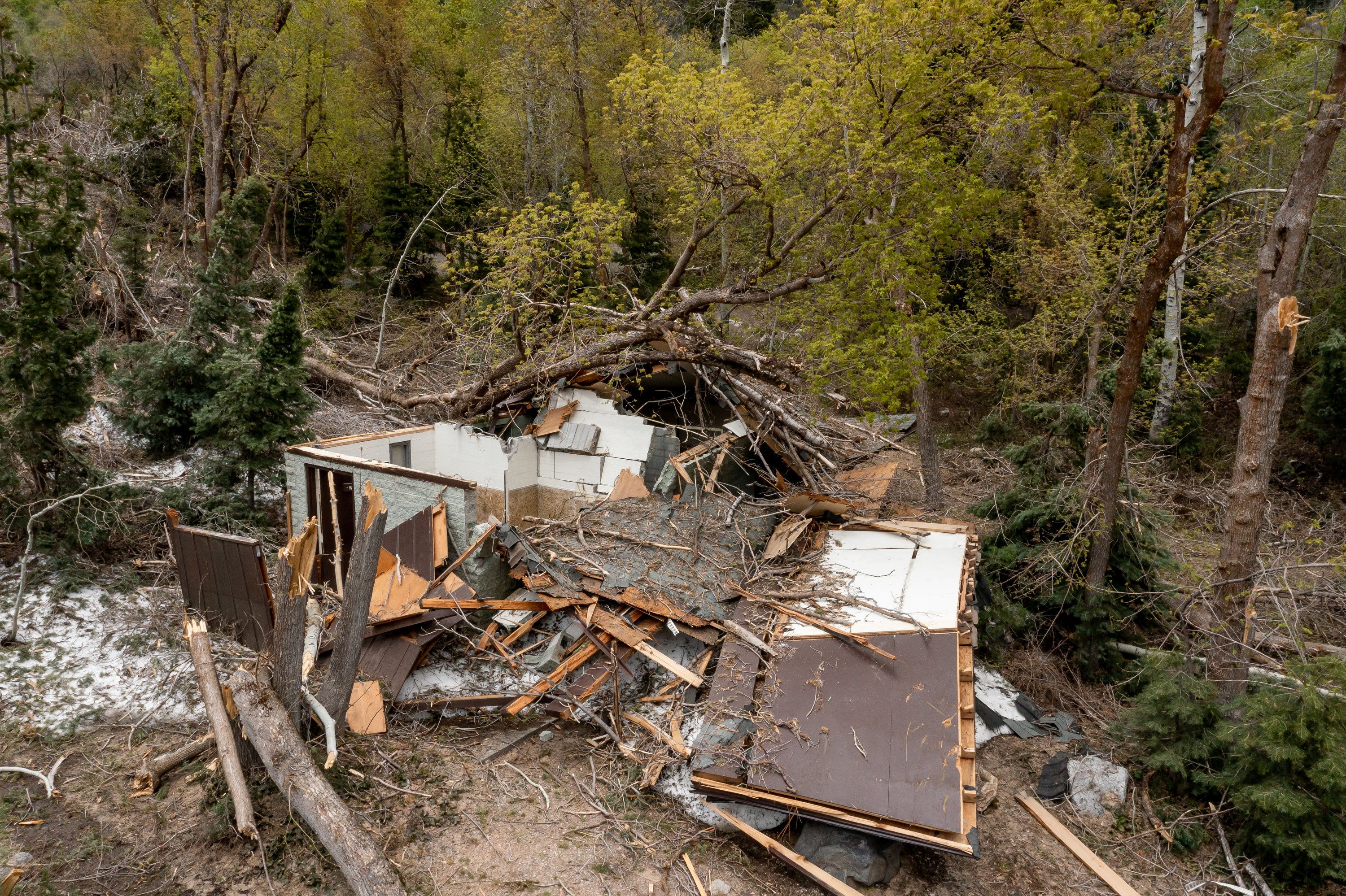 A building that was flattened by an avalanche at Tanners Flat Campground in Little Cottonwood Canyon in Salt Lake County is pictured on Thursday.
