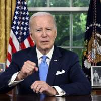 Biden signs debt ceiling bill that pulls US back from brink of unprecedented default
