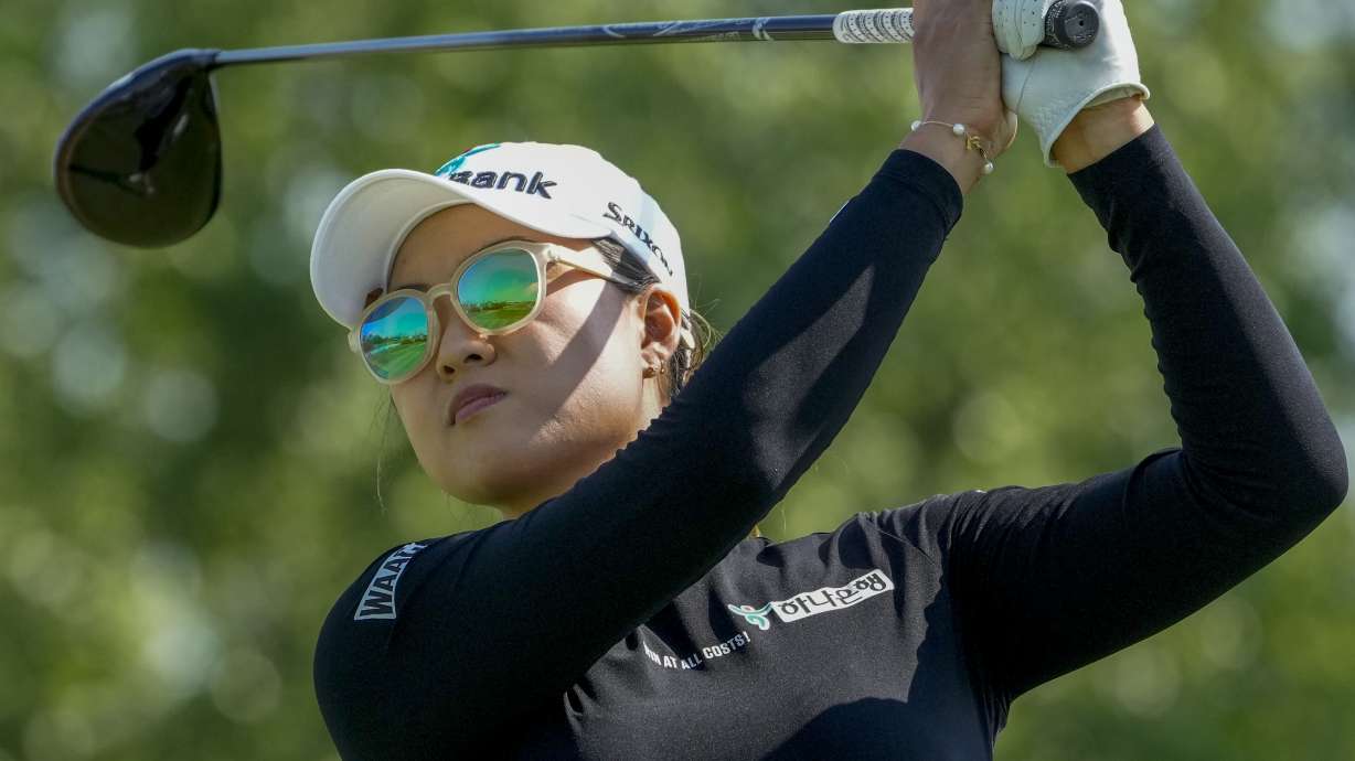 Minjee Lee, of Australia, hits off the 18th tee during the first round of the Mizuho Americas Open golf tournament, Thursday, June 1, 2023, at Liberty National Golf Course in Jersey City, N.J.