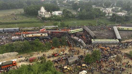 A drone shot of rescuers work at the site of passenger trains accident, in Balasore district, in the eastern Indian state of Orissa, Saturday, June 3, 2023. Rescuers are wading through piles of debris and wreckage to pull out bodies and free people after two passenger trains derailed in India, killing more than 280 people. Hundreds of others were trapped inside more than a dozen mangled rail cars, in one of the country's deadliest train crashes in decades.
