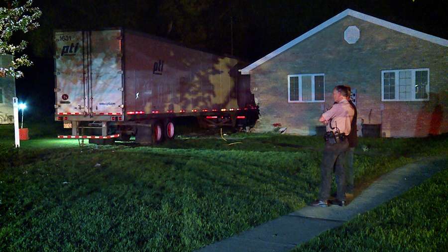 The Maxfield family had to sort through their belongings after a semitruck and trailer smashed through their Bear Lake property.