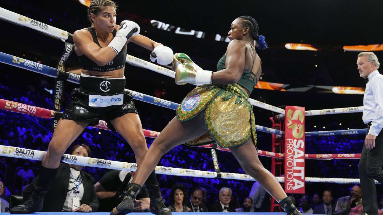 Claressa Shields, right, leans back from Maricela Cornejo during a middleweight boxing bout Saturday, June 3, 2023, in Detroit.