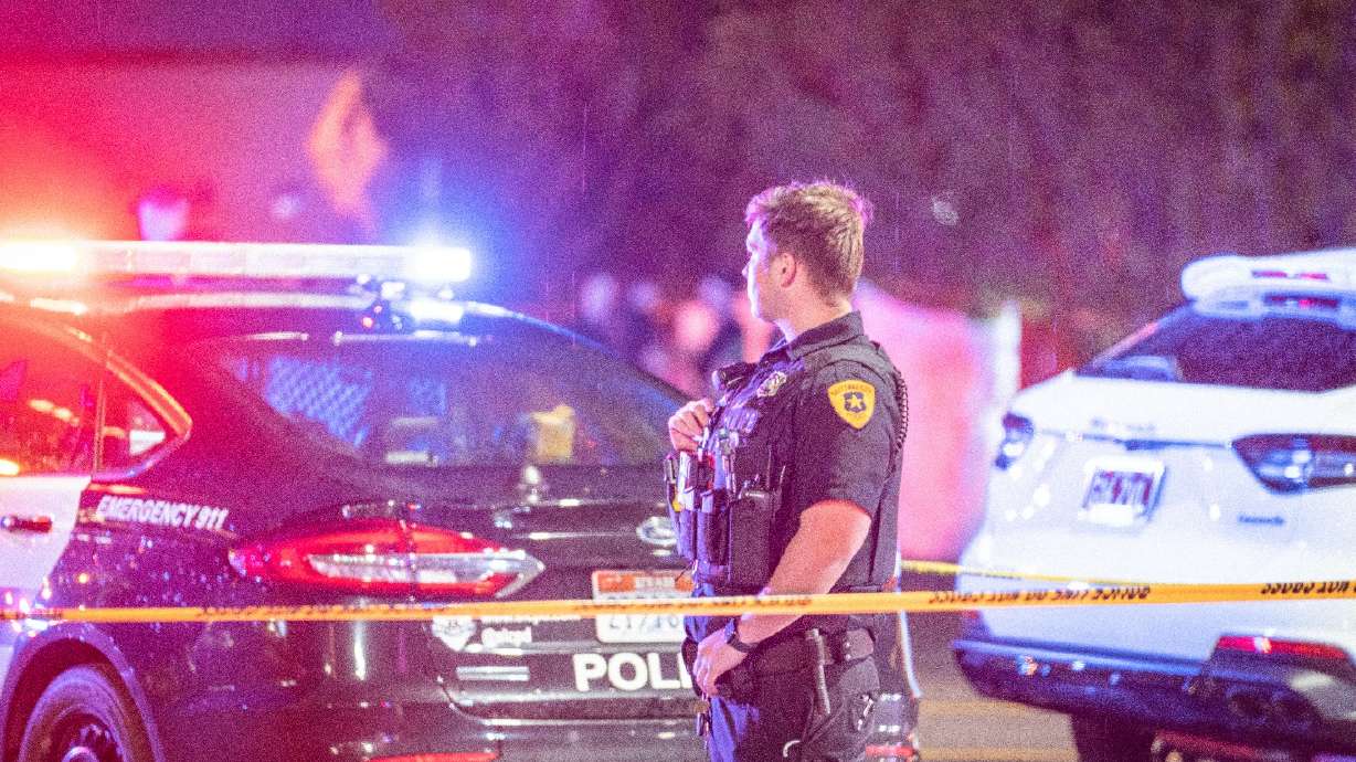 A Salt Lake City police officer responds to a deadly shooting by 60 W. Market Street on June 4, 2023. Molitoni Fisiki Vainuku was booked into jail Friday for investigation of murder.