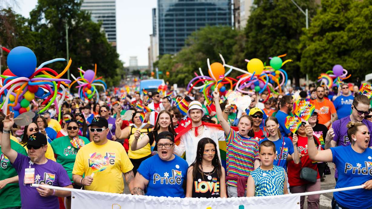 Thousands of participants walk during the 2023 Utah Pride Parade in downtown Salt Lake City on Sunday.