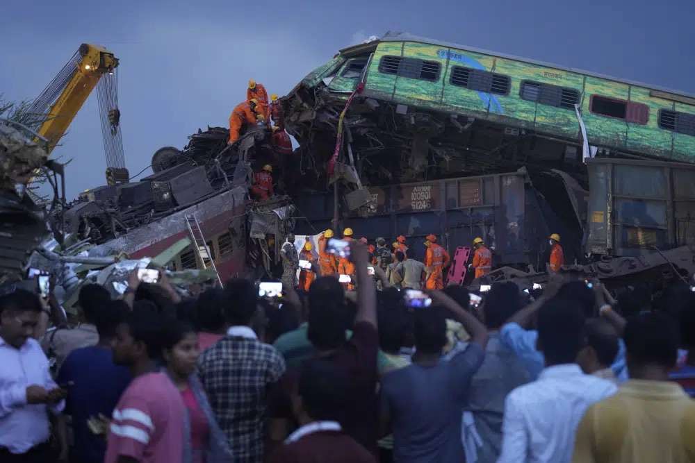 Rescuers work to take out the body of a victim of passenger trains that derailed in Balasore district, in the eastern Indian state of Orissa, Saturday. Rescuers in India have found no more survivors in the overturned and mangled wreckage of two passenger trains that derailed, killing about 275 people and injuring hundreds in one of the country’s deadliest rail crashes in decades.